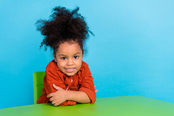 Portrait of adorable good mood little student kindergarten girl sit patiently listen lesson...