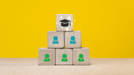 Obraz premium Employee red icon, silhouette on concrete cube, different thinking and human development concept.