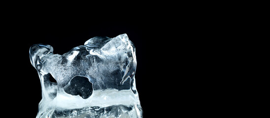 A piece of floe with frozen air bubbles pattern and textures. Cold arctic winter wallpaper concept....