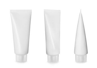 Set with blank tubes of cosmetic products on white background. Mockup for design