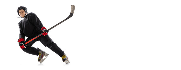 Obraz premium Flyer, poster with portrait of concentrated boy, child, hockey player in motion, training isolated over white background.