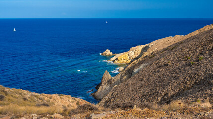 Rocky Coastline and Cliffs, Los Escullos, Cabo de Gata-Níjar Natural Park, UNESCO Biosphere Reserve, Hot Desert Climate Region, Almería, Andalucía, Spain, Europe