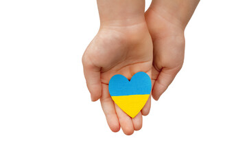heart with painted yellow blue flag in hands of child on white background