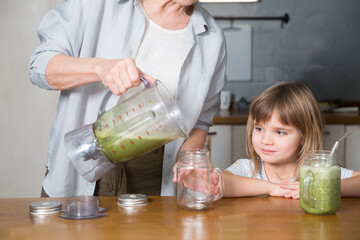 Healthy nutrition in the family, vegetarianism. Senior lifestyle. grandmother and granddaughter...