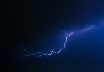 Lightning trail in the dark sky