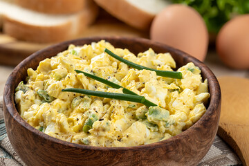 Egg salad in a wooden bowl