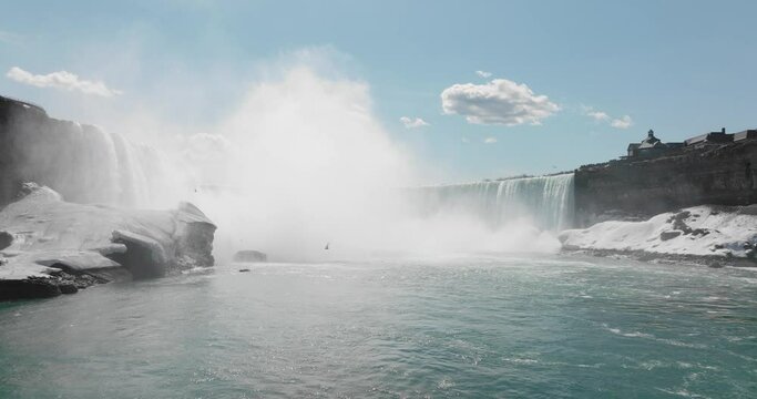 Niagara falls in early spring, Drone, slow flight approaching the falls, in 4k