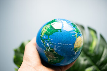 hand holding globe environment esg concept