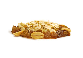 Oatmeal flakes mixed with nuts and raisins isolated on white background