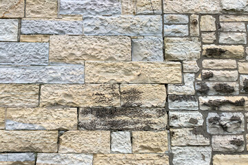 Grey and brown textured block wall