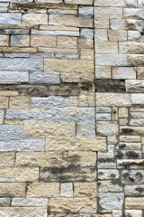 Grey and brown textured block wall