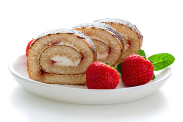 biscuit roll with red ripe strawberries on a light background