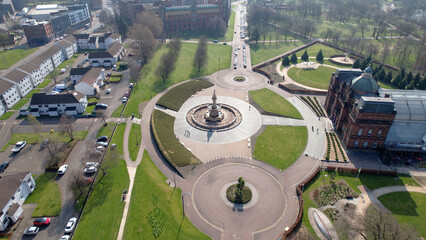 Aerial image over the Doulton Fountain in Glasgow Green, a park next to the River Clyde near the City Centre.
