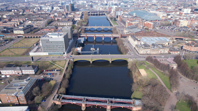 Low level aerial image over the River Clyde near to the Centre of the city of Glasgow, in Central Scotland. With panoramic view over the cityscape.