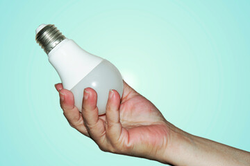 LED light bulb in hand. Inspiration idea innovation concept, saving energy concept. 