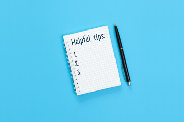 The text Helpful tips is written on a notebook page