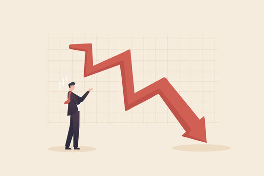 Financial Crisis , Stock Market Plunge. Businessman looks at the graph and is depressed.