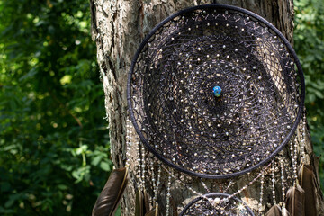 Handmade dream catcher with feathers threads and beads rope hanging