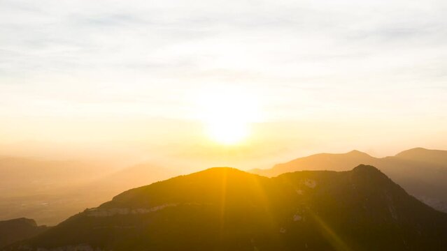Time lapse of sunset in Mare De Deu Del Mont peak, La Garrotxa, Spain