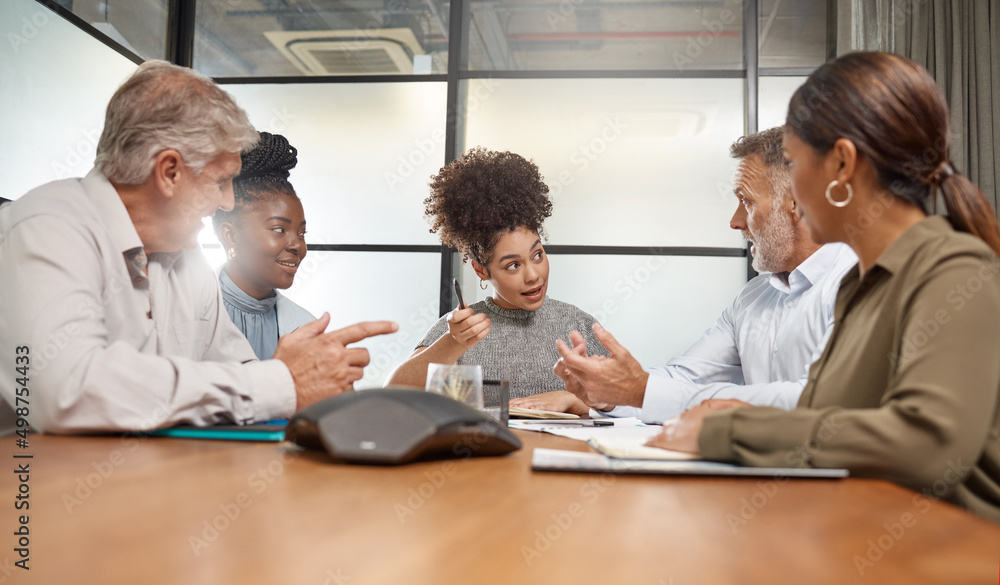 Poster sometimes you have to have difficult conversations. shot of a group of businesspeople in a meeting a