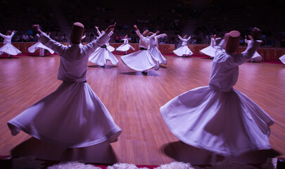whirling dervishes are performing