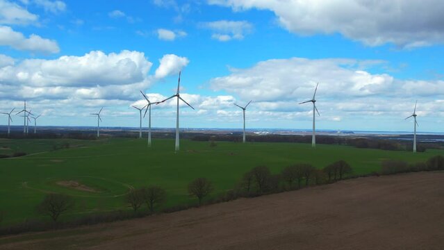 a drone image of a wind farm near the Baltic Sea
