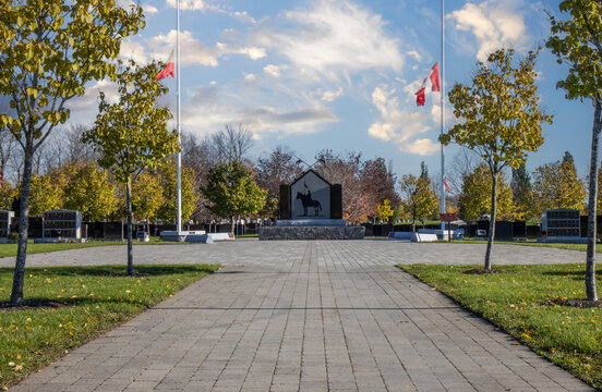 National memorial for Royal Canadian Mounted Police officers killed in the line of duty, monument, paving stones in foreground, daytime, nobody
