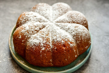 Homemade  Italian style  Easter  bread cake, spring blossom  and  hand colored eggs. Homemade pastry.  Easter holiday baking and decorarion