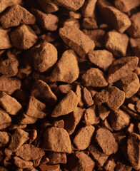 Instant coffee granules as background.
