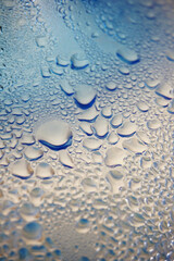 Water drops pattern in blue shade of water cooler bottle              