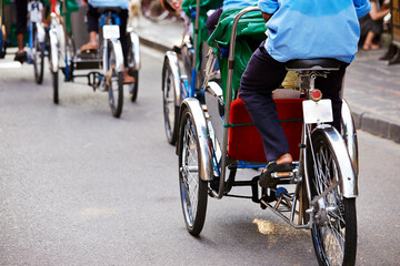 Fototapeta na wymiar Cyclo on the road in Southeast Asia