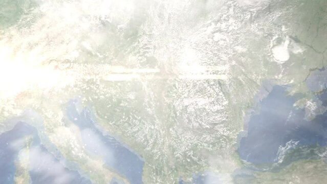 Earth zoom in from outer space to city. Zooming on Arad, Romania. The animation continues by zoom out through clouds and atmosphere into space. Images from NASA