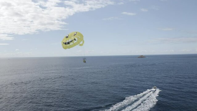 parasailing over the sea