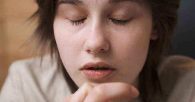 Young woman feeling despair and stress, pain and depression. Person made a mistake. Close-up portrait with strong emotions of woman looking at camera. Concept of people having problem and trouble.