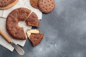 Reikäleipä - traditional finnish rye bread on a gray concrete background