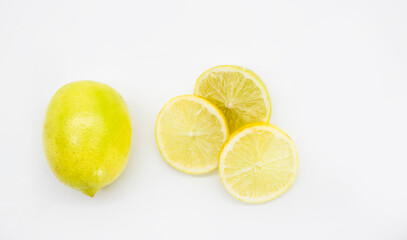 selective focus,fresh Lemon pieces isolated on white