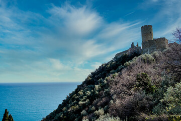 Fototapeta na wymiar the medieval castle of Noli, on the heights of the western Ligurian coast