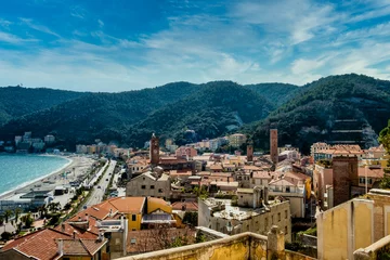 Fototapeten the medieval tower of the seaside village of Noli, in western Liguria, a well-known tourist resort © roberto muratore