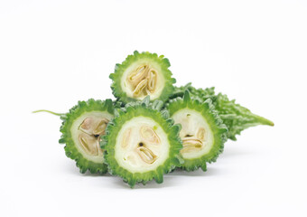 bitter melon or bitter gourd pieces isolated on white background