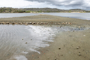 Walk along the salty shores of the Jan Thiel lagoon on the Caribbean island Curacao