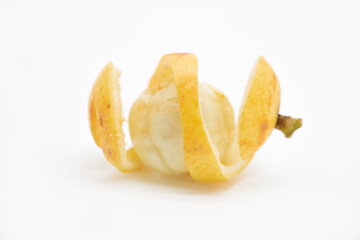 Baccaurea motleyana skin slice on white background, selective focus