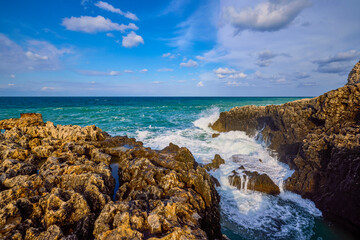 Beautiful landscape with a rocky sea shore on a sunny day
