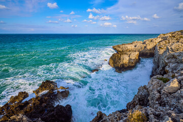 Beautiful landscape with a rocky sea shore on a sunny day