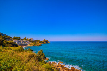 Beautiful landscape with a rocky sea shore on a sunny day