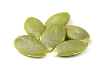 Pumpkin seeds macro view isolated on a white background. Healthy raw food