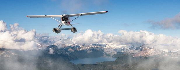 Fototapeta na wymiar Single Engine Seaplane Flying over the Rocky Mountain Landscape. Adventure Composite. 3D Rendering Plane. Aerial Background from British Columbia near Vancouver, Canada.