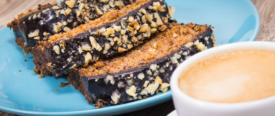 Zucchini dough and cup of white coffee on board. Delicious dessert
