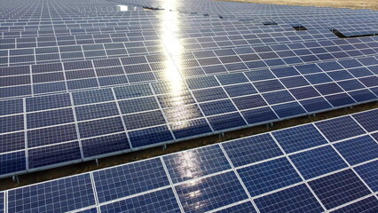 Solar power stations. Blue solar power plant modules close up. Alternative renewable clean green...