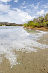 Walk along the salty shores of the Jan Thiel lagoon on the Caribbean island Curacao