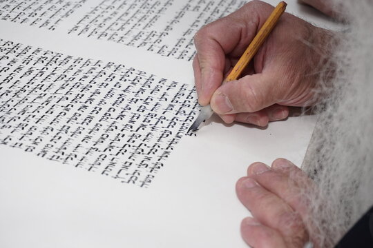 Sofer writes a sefer Torah